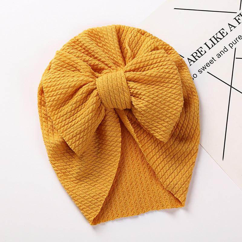 Close-up of Pit Strip Children's Hat fabric showing breathable mesh