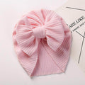 ql lPit Strip Children's Hat on happy toddler at beach, red and white stripes